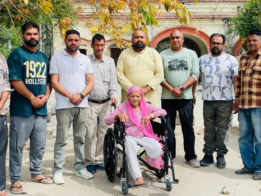 Example of Social Service Wheelchair Presented to a Needy Elderly Woman